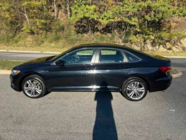 Черный Фольксваген Джетта, объемом двигателя 1.4 л и пробегом 56 тыс. км за 10000 $, фото 3 на Automoto.ua