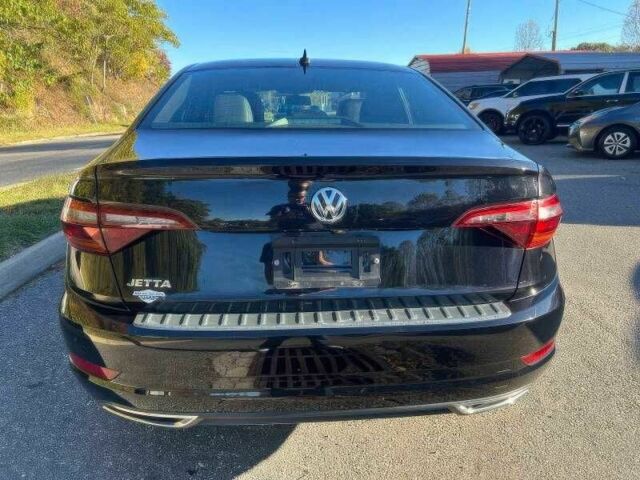 Черный Фольксваген Джетта, объемом двигателя 1.4 л и пробегом 56 тыс. км за 10000 $, фото 5 на Automoto.ua