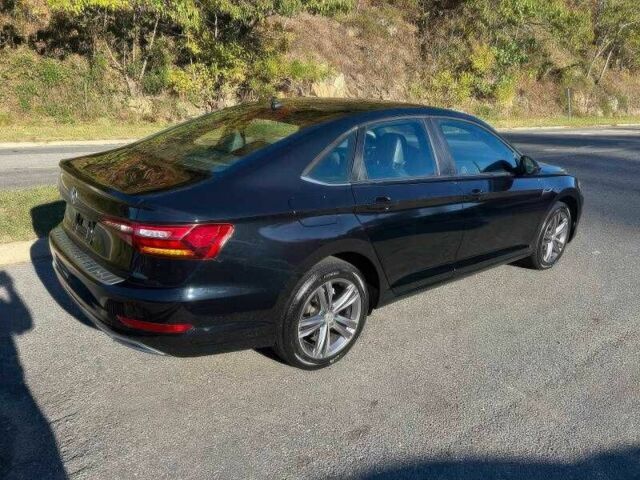 Черный Фольксваген Джетта, объемом двигателя 1.4 л и пробегом 56 тыс. км за 10000 $, фото 6 на Automoto.ua