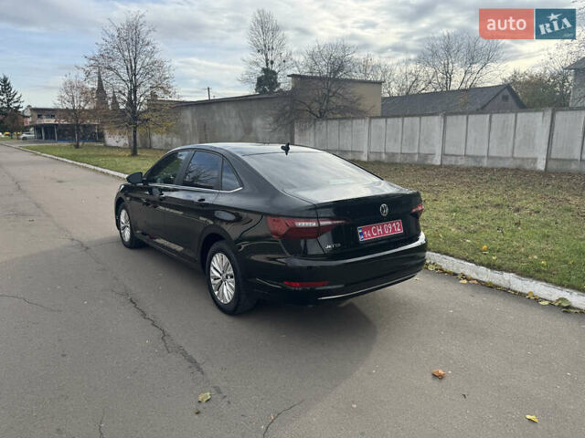 Черный Фольксваген Джетта, объемом двигателя 1.4 л и пробегом 105 тыс. км за 14200 $, фото 7 на Automoto.ua