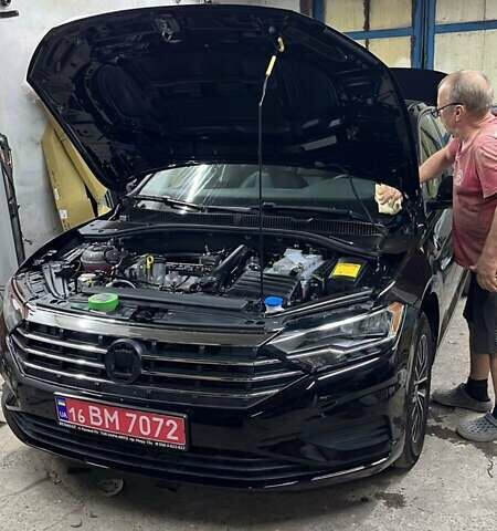 Черный Фольксваген Джетта, объемом двигателя 1.4 л и пробегом 85 тыс. км за 16500 $, фото 5 на Automoto.ua