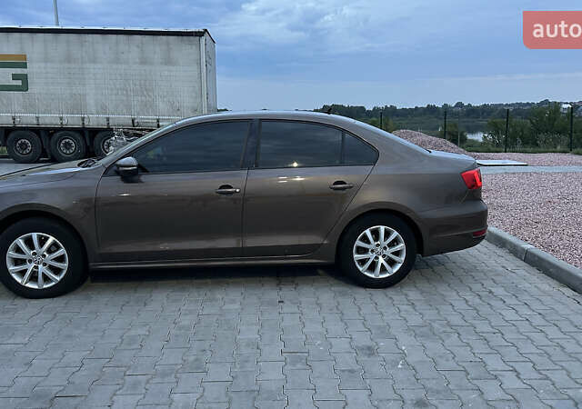 Коричневый Фольксваген Джетта, объемом двигателя 1.39 л и пробегом 261 тыс. км за 9000 $, фото 5 на Automoto.ua