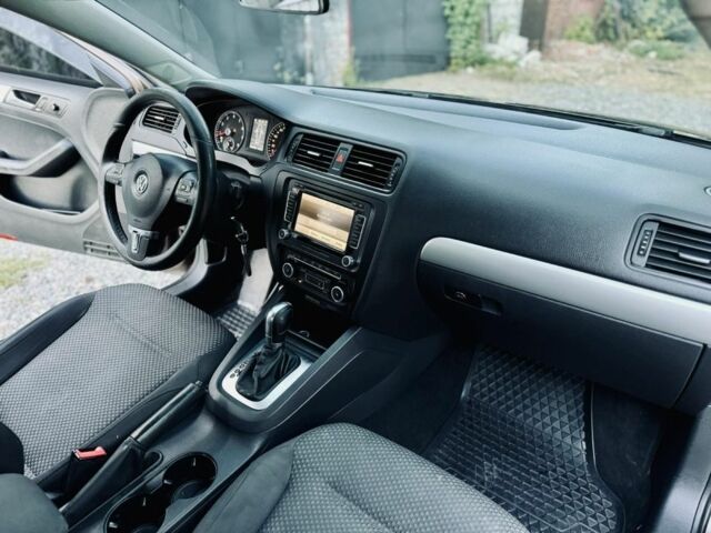 Коричневий Фольксваген Джетта, об'ємом двигуна 1.4 л та пробігом 220 тис. км за 8200 $, фото 6 на Automoto.ua