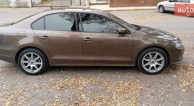 Коричневый Фольксваген Джетта, объемом двигателя 1.6 л и пробегом 108 тыс. км за 15500 $, фото 2 на Automoto.ua