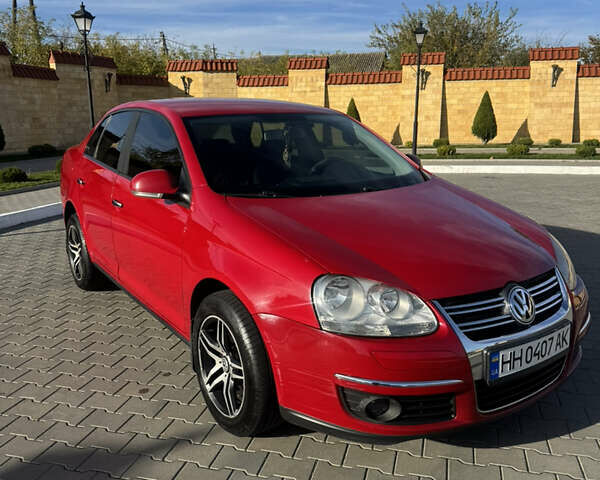 Красный Фольксваген Джетта, объемом двигателя 1.6 л и пробегом 125 тыс. км за 6000 $, фото 1 на Automoto.ua