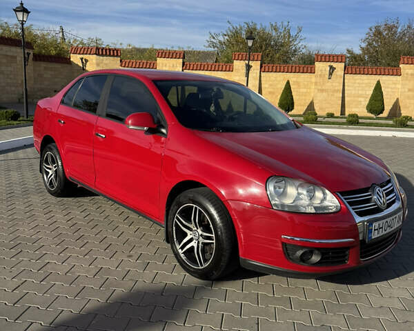 Красный Фольксваген Джетта, объемом двигателя 1.6 л и пробегом 125 тыс. км за 6000 $, фото 6 на Automoto.ua
