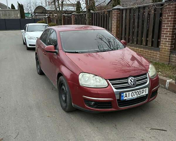 Красный Фольксваген Джетта, объемом двигателя 1.6 л и пробегом 310 тыс. км за 4500 $, фото 1 на Automoto.ua