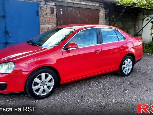 Красный Фольксваген Джетта, объемом двигателя 1.4 л и пробегом 198 тыс. км за 6000 $, фото 1 на Automoto.ua