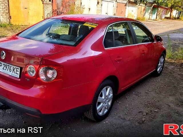 Красный Фольксваген Джетта, объемом двигателя 1.4 л и пробегом 198 тыс. км за 6000 $, фото 4 на Automoto.ua