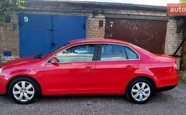 Красный Фольксваген Джетта, объемом двигателя 1.4 л и пробегом 198 тыс. км за 6000 $, фото 1 на Automoto.ua