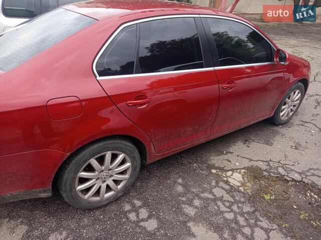 Червоний Фольксваген Джетта, об'ємом двигуна 1.39 л та пробігом 130 тис. км за 7350 $, фото 2 на Automoto.ua