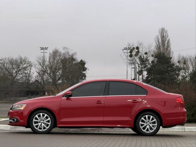 Красный Фольксваген Джетта, объемом двигателя 1.8 л и пробегом 208 тыс. км за 9850 $, фото 4 на Automoto.ua