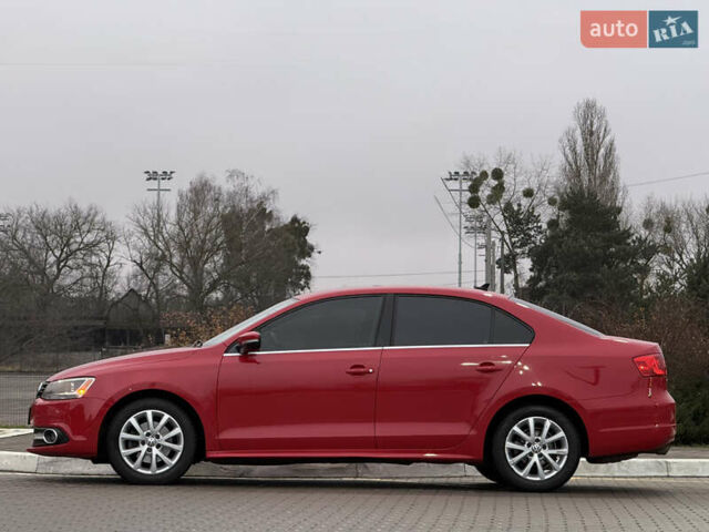 Червоний Фольксваген Джетта, об'ємом двигуна 1.8 л та пробігом 208 тис. км за 9850 $, фото 11 на Automoto.ua