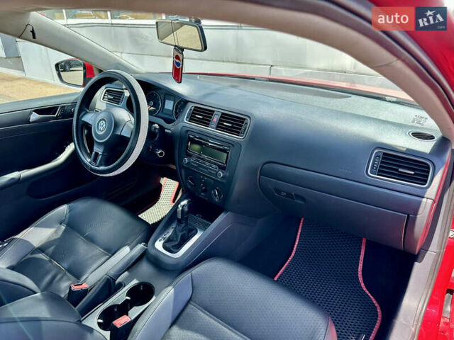 Червоний Фольксваген Джетта, об'ємом двигуна 1.8 л та пробігом 217 тис. км за 7990 $, фото 43 на Automoto.ua
