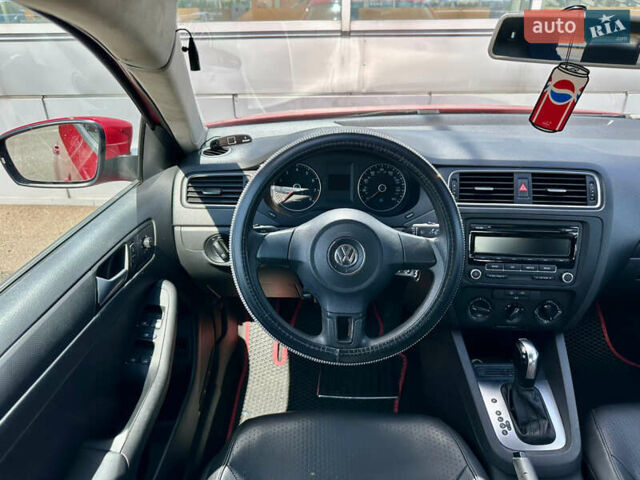 Червоний Фольксваген Джетта, об'ємом двигуна 1.8 л та пробігом 217 тис. км за 7990 $, фото 50 на Automoto.ua