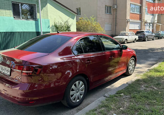 Красный Фольксваген Джетта, объемом двигателя 1.4 л и пробегом 158 тыс. км за 12250 $, фото 5 на Automoto.ua