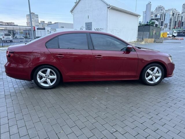 Красный Фольксваген Джетта, объемом двигателя 1.4 л и пробегом 53 тыс. км за 8999 $, фото 5 на Automoto.ua