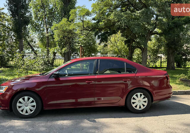 Красный Фольксваген Джетта, объемом двигателя 1.4 л и пробегом 158 тыс. км за 12250 $, фото 2 на Automoto.ua