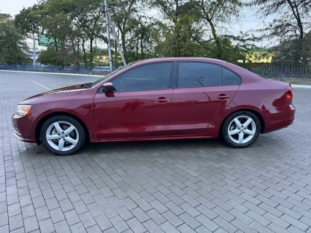 Красный Фольксваген Джетта, объемом двигателя 1.4 л и пробегом 53 тыс. км за 8999 $, фото 1 на Automoto.ua