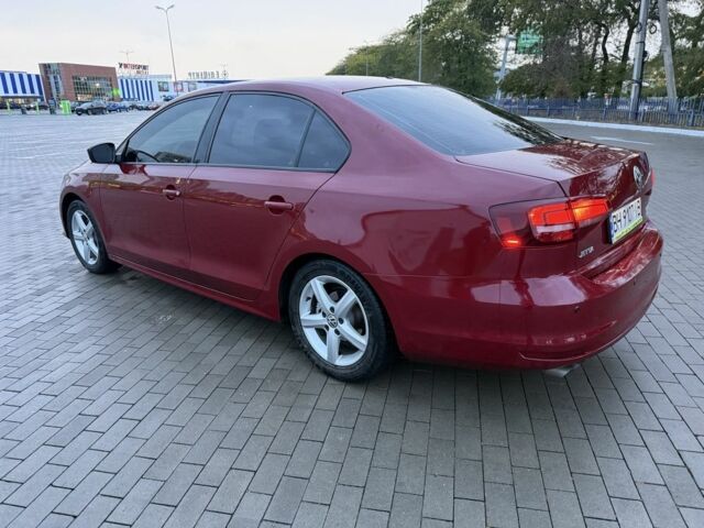 Красный Фольксваген Джетта, объемом двигателя 1.4 л и пробегом 53 тыс. км за 8999 $, фото 2 на Automoto.ua