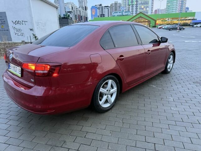 Красный Фольксваген Джетта, объемом двигателя 1.4 л и пробегом 53 тыс. км за 8999 $, фото 4 на Automoto.ua