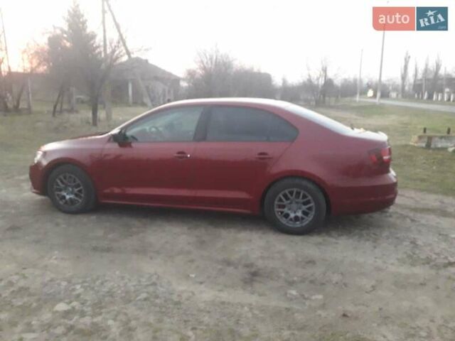 Красный Фольксваген Джетта, объемом двигателя 1.4 л и пробегом 112 тыс. км за 9100 $, фото 7 на Automoto.ua