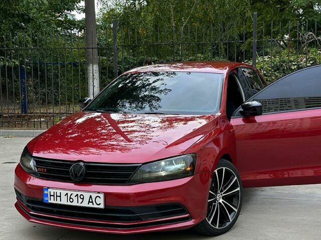 Красный Фольксваген Джетта, объемом двигателя 1.4 л и пробегом 125 тыс. км за 9800 $, фото 3 на Automoto.ua