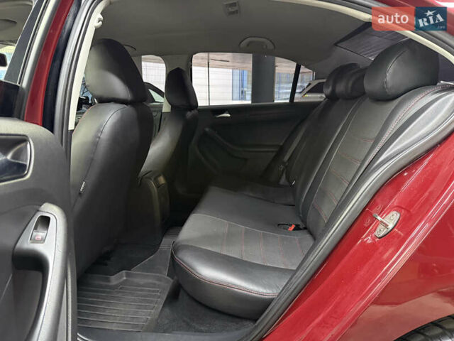 Червоний Фольксваген Джетта, об'ємом двигуна 1.39 л та пробігом 209 тис. км за 9900 $, фото 23 на Automoto.ua