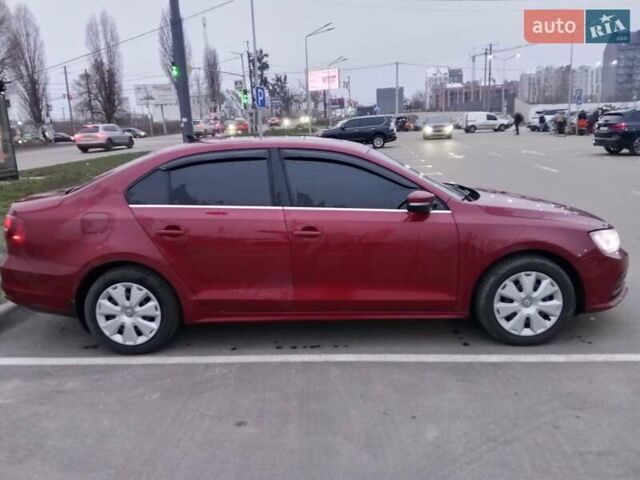 Красный Фольксваген Джетта, объемом двигателя 1.39 л и пробегом 211 тыс. км за 12100 $, фото 6 на Automoto.ua