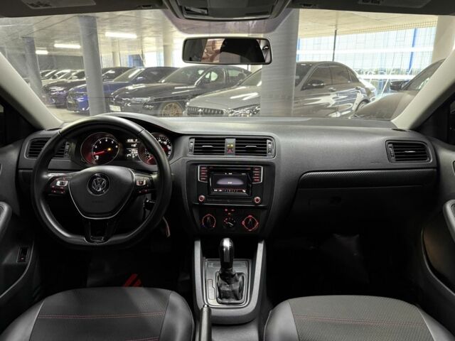 Червоний Фольксваген Джетта, об'ємом двигуна 1.4 л та пробігом 208 тис. км за 9900 $, фото 21 на Automoto.ua