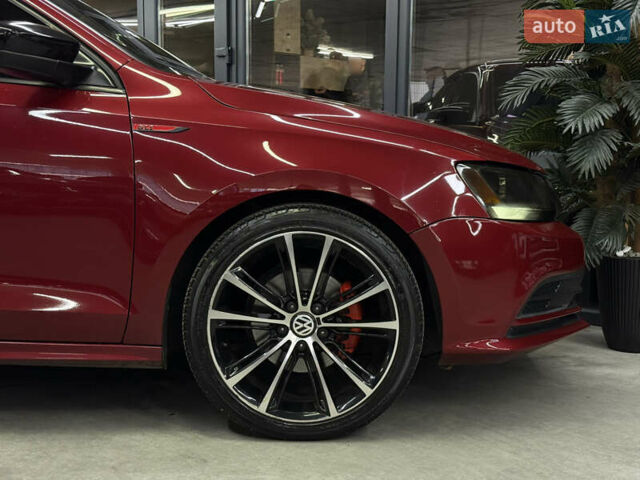 Червоний Фольксваген Джетта, об'ємом двигуна 1.39 л та пробігом 209 тис. км за 9900 $, фото 4 на Automoto.ua