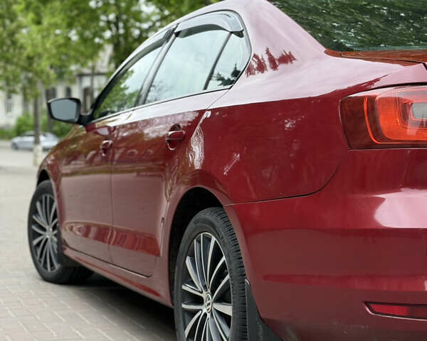 Фольксваген Джетта 2016 в Сумах на Automoto.ua Красный Фольксваген Джетта, объемом двигателя 1.4 л и пробегом 105 тыс. км за 10200 $, фото 17 на Automoto.ua