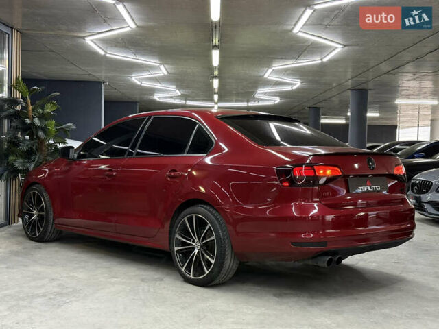 Червоний Фольксваген Джетта, об'ємом двигуна 1.39 л та пробігом 209 тис. км за 9900 $, фото 10 на Automoto.ua