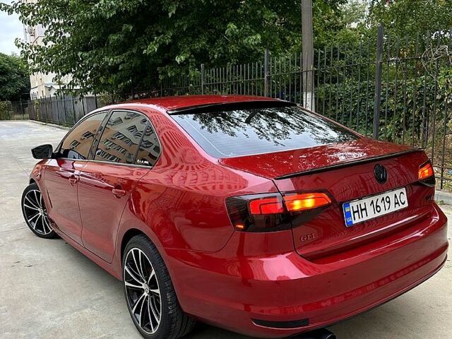 Красный Фольксваген Джетта, объемом двигателя 1.4 л и пробегом 125 тыс. км за 9800 $, фото 2 на Automoto.ua