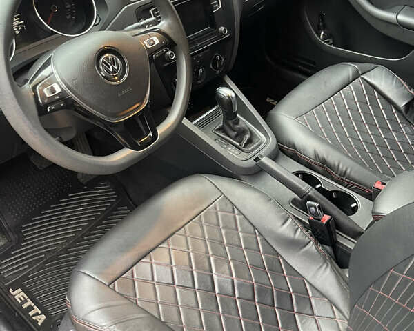 Красный Фольксваген Джетта, объемом двигателя 1.4 л и пробегом 85 тыс. км за 10900 $, фото 10 на Automoto.ua