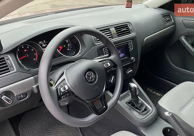 Червоний Фольксваген Джетта, об'ємом двигуна 1.4 л та пробігом 74 тис. км за 11499 $, фото 15 на Automoto.ua