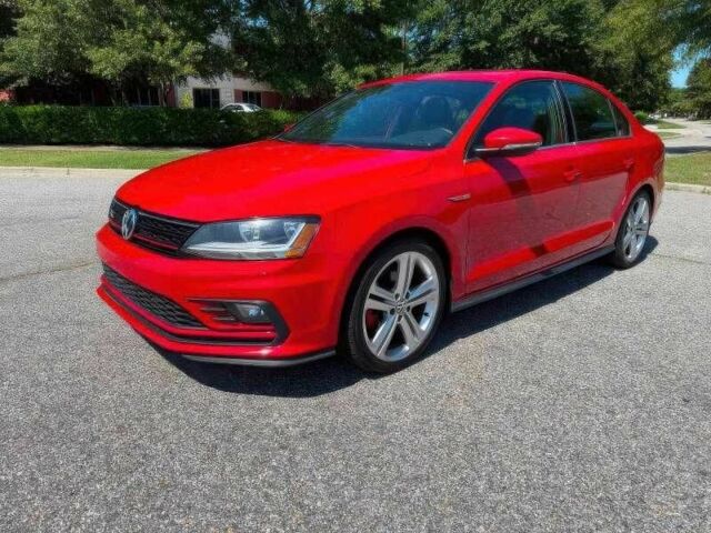 Красный Фольксваген Джетта, объемом двигателя 2 л и пробегом 99 тыс. км за 9300 $, фото 2 на Automoto.ua