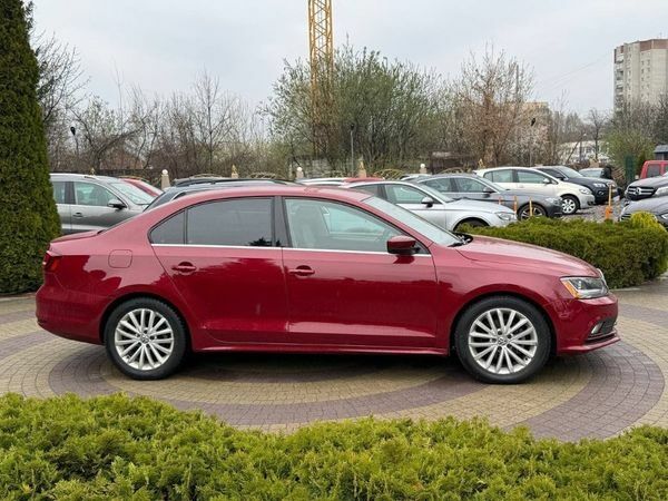 Червоний Фольксваген Джетта, об'ємом двигуна 1.4 л та пробігом 97 тис. км за 12300 $, фото 3 на Automoto.ua