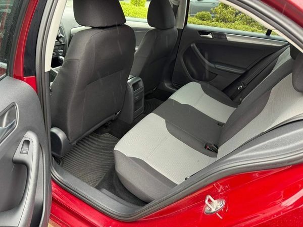 Червоний Фольксваген Джетта, об'ємом двигуна 1.4 л та пробігом 97 тис. км за 12300 $, фото 12 на Automoto.ua