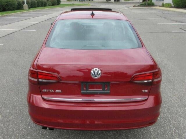 Красный Фольксваген Джетта, объемом двигателя 1.8 л и пробегом 54 тыс. км за 5300 $, фото 5 на Automoto.ua