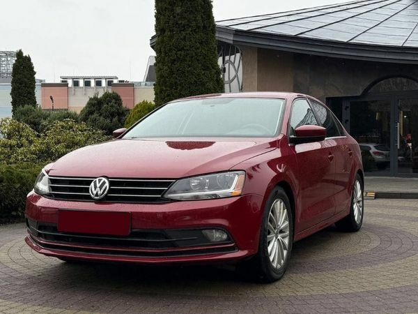 Червоний Фольксваген Джетта, об'ємом двигуна 1.4 л та пробігом 97 тис. км за 12300 $, фото 2 на Automoto.ua