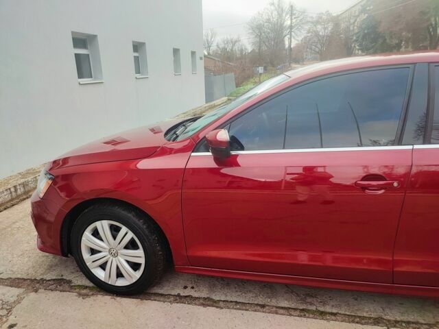 Красный Фольксваген Джетта, объемом двигателя 1.4 л и пробегом 97 тыс. км за 11100 $, фото 14 на Automoto.ua
