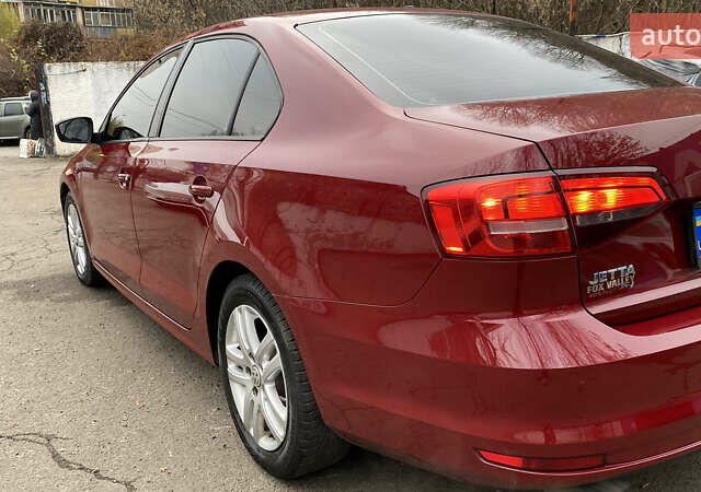 Червоний Фольксваген Джетта, об'ємом двигуна 1.4 л та пробігом 74 тис. км за 11499 $, фото 6 на Automoto.ua