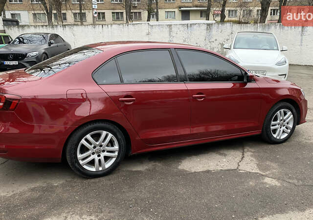 Червоний Фольксваген Джетта, об'ємом двигуна 1.4 л та пробігом 74 тис. км за 11499 $, фото 4 на Automoto.ua