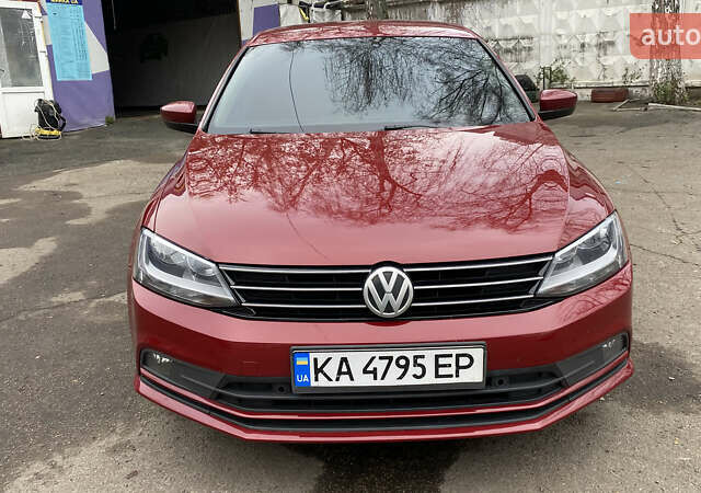 Червоний Фольксваген Джетта, об'ємом двигуна 1.4 л та пробігом 74 тис. км за 11499 $, фото 8 на Automoto.ua