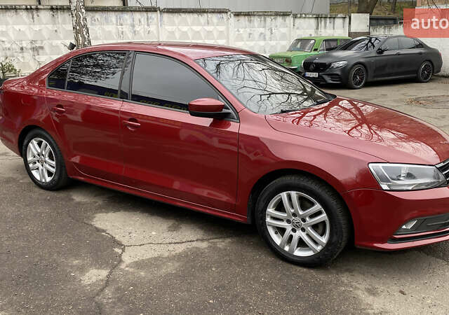 Червоний Фольксваген Джетта, об'ємом двигуна 1.4 л та пробігом 74 тис. км за 11499 $, фото 3 на Automoto.ua