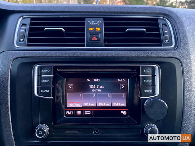 Красный Фольксваген Джетта, объемом двигателя 1.4 л и пробегом 88 тыс. км за 11700 $, фото 11 на Automoto.ua