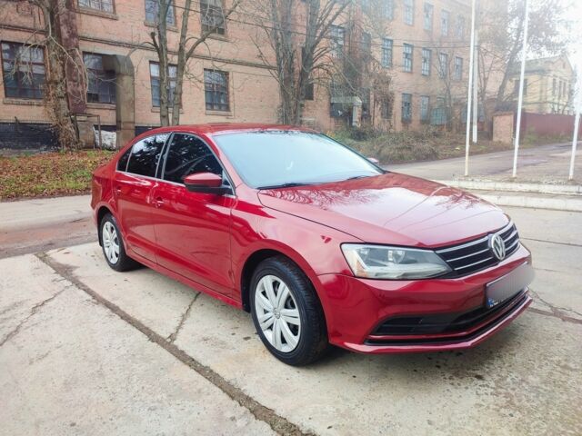 Красный Фольксваген Джетта, объемом двигателя 1.4 л и пробегом 97 тыс. км за 11100 $, фото 2 на Automoto.ua