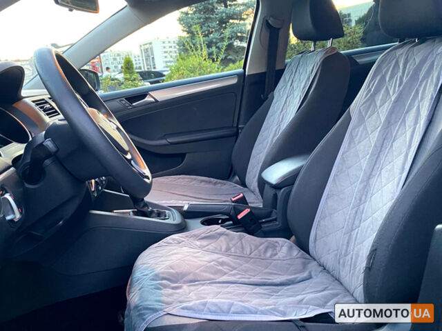 Красный Фольксваген Джетта, объемом двигателя 1.4 л и пробегом 88 тыс. км за 11700 $, фото 7 на Automoto.ua