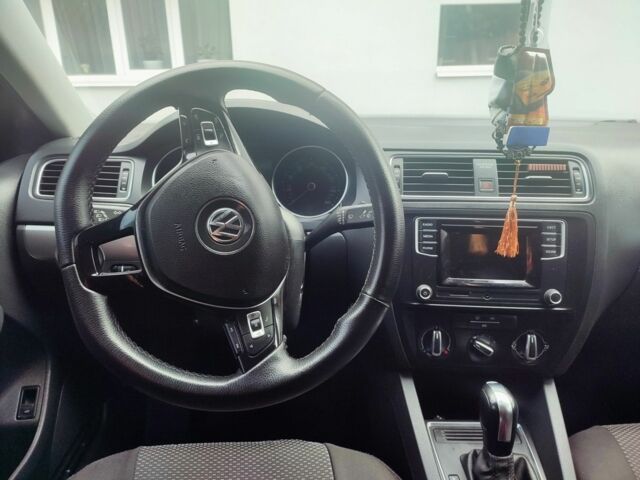 Красный Фольксваген Джетта, объемом двигателя 1.4 л и пробегом 97 тыс. км за 11100 $, фото 16 на Automoto.ua